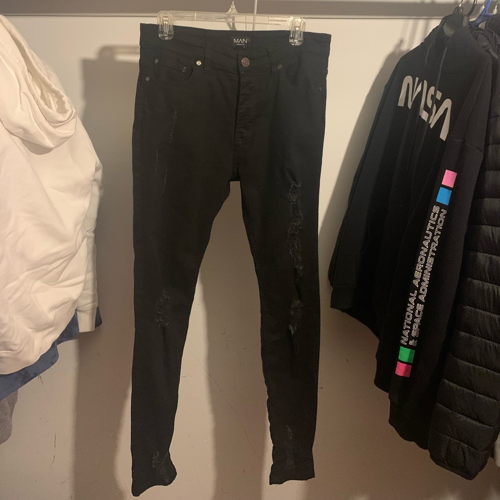 Black distressed denim